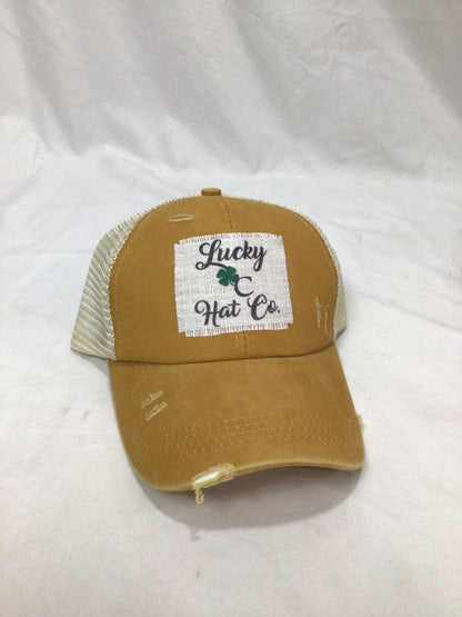 Lucky C Hat Co. clover logo, raggy patch, ladies ponytail hat